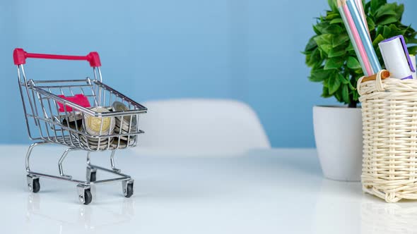 Money stack on shopping cart,Money saving and economy concept, 4K stop motion alt