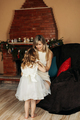 Adorable mom and daughter dress up in beautiful dresses for Christmas - PhotoDune Item for Sale