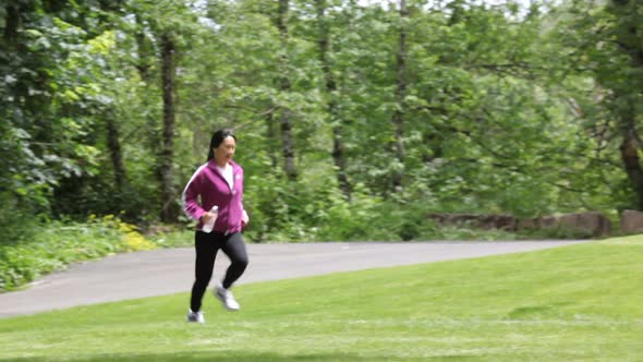 Woman running at park