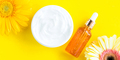 Generic white cream jar and glass serum on yellow background - PhotoDune Item for Sale