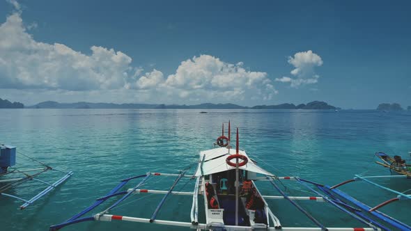 Boats at Ocean Bay with Azure Water Surface. Serene Seascape of Calm Waterfront with Vessel alt