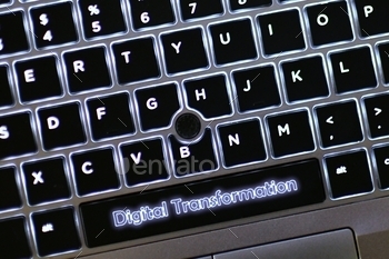 Digital Transformation concept - laptop computer keys