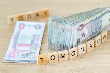 buy, cash, commercial, cost, credit, crisis, currency, deposit, dirhams, earning, emirates, finance, fund, income, investment, jackpot, loan, lottery, middle east, money, paper money, payment, profit, raise, rate, reduction, retirement, revenue, rich, salary, salary raise, save, savings, sell, stock market, stocks, taxes, thousand, trade, transaction, value, vat, wages, winning