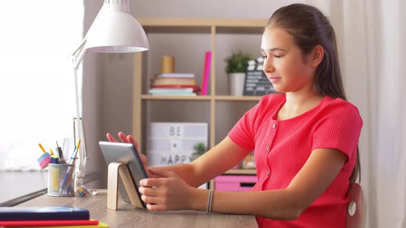 Student Girl with Tablet Pc Learning at Home