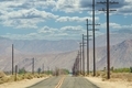 Beautiful day in the empty desert with pattern of telephone poles and electrical power lines & wires - PhotoDune Item for Sale