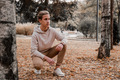 Young blonde boy posing in the park  - PhotoDune Item for Sale