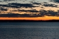 Dramatic sunset sky over mountains and sea. - PhotoDune Item for Sale