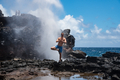 Man doing yoga pose next to a blow hole on Maui.  - PhotoDune Item for Sale