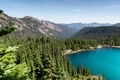 Alpine emerald green lake in evergreen forest. - PhotoDune Item for Sale