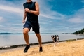 Running with pet dog chasing - PhotoDune Item for Sale