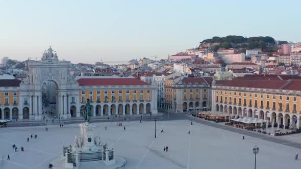 Aerial Ascending View of People on Praca Do Comercio Public Square in Lisbon with Arco Da Rua