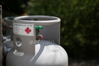 , energy industry, liquid natural gas, large, home, outside, chemical, liquid, dangerous, domestic, oxygen, explosive, natural, distribution, technology, industrial, industry, power, cylinder, lpg, butane, storage, danger, propane, fuel, container, pressure, equipment, metal, canister, safety, white, protection, steel, combustible, green, bottle, flammable, energy, liquefied, object, valve, compressed, background