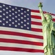 Statue of Liberty in Front of Waving American Flag - VideoHive Item for Sale