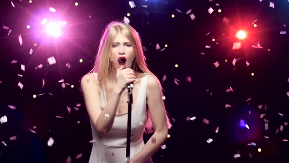 Girl Singing and Dancing with Retro Microphone Strobe Lighting Effect