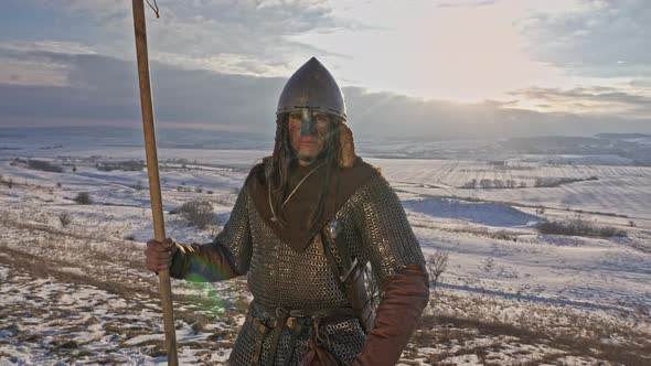 Portrait of medieval viking warrior in armor.