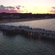 Cinematic pier in the sunset from a bird's eye view. Filming at sunset in Sopot. - VideoHive Item for Sale