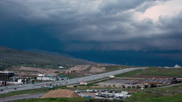 Time lapse of dark storm clouds rolling through the sky