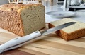 Sliced homemade white bread with knife on cutting board  - PhotoDune Item for Sale