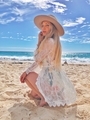 Beautiful blonde girl at the beach wearing hat - PhotoDune Item for Sale