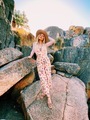 Stylish Traveler girl with blonde long hair wearing hat exploring Australia - PhotoDune Item for Sale