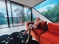 Beautiful blonde girl drinking white wine at the luxury villa - PhotoDune Item for Sale