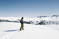 Man snowboarding in the snowy mountains - PhotoDune Item for Sale