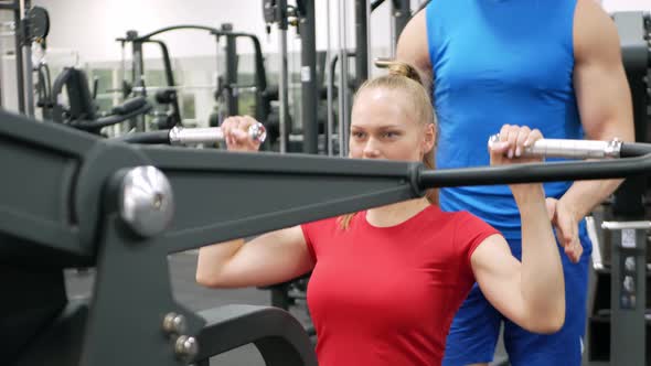 Teenager Performs Exercise on Simulator