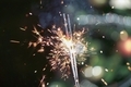 New year's celebration sparklers against the Christmas tree background. - PhotoDune Item for Sale
