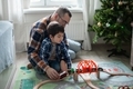 Dad and son playing with wooden toy railway train in kids room, father and son, baby boy family look - PhotoDune Item for Sale