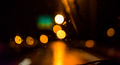 Close up of water drops on windshield with blurry street and car lights  - PhotoDune Item for Sale