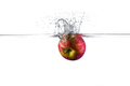 Apple splashing into water against white background  - PhotoDune Item for Sale