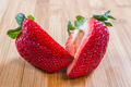 Strawberry pieces on bamboo cutting board - PhotoDune Item for Sale