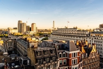 sunny day at sunset. Brexit, Britain, High Angle View, International Landmark, London, Strand, UK, United Kingdom, banking, blue, british, building, business, capital, city, construction, crane, day, downtown, england, english, europe, european, exterior, famous, finance, financial, global finance, golden, landmark, modern, office, panorama, plane, roof, sightseeing, sky, sunny, sunset, tourism, tower, travel, urban, weather, westminster