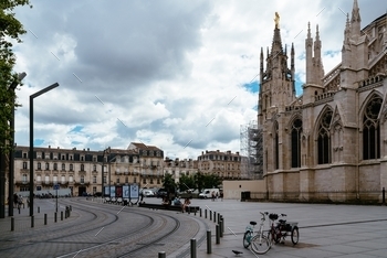 land square. Bordeaux; Vertical; ancient; andre; andrew; aquitaine; arch; architecture; archivolt; building; cathedral; catholic; christian; church; city; cloudy; door; entrance; europe; european; exterior; facade; famous; france; french; gothic; heritage; historic; historical; history; holy; landmark; medieval; monument; old; outdoors; people; religion; saint; sculpture; st; stone; temple; tourism; town; travel; unesco; urban; view;