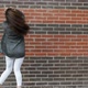 Young Woman Dancing Against a Brick Wall Walking Around the City - VideoHive Item for Sale