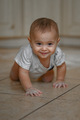 The baby at home in the kitchen got dirty in flour - PhotoDune Item for Sale