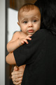 Mom holds her little son tightly in her arms - PhotoDune Item for Sale
