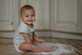 The baby at home in the kitchen got dirty in flour - PhotoDune Item for Sale