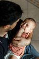 The baby is crying in his dad's arms - PhotoDune Item for Sale