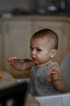 A little boy eats porridge for breakfast - PhotoDune Item for Sale
