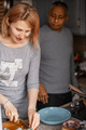 an international family preparing dinner. - PhotoDune Item for Sale