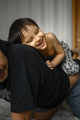 A three-year-old boy rides his dad's back. Dad is playing with his son - PhotoDune Item for Sale