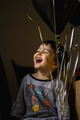A three-year-old boy with nail balls. A happy child at his birthday - PhotoDune Item for Sale