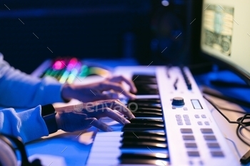 Man working in a modern technological sound and visual studio