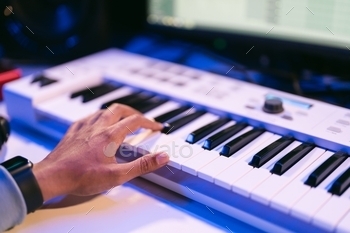 Man working in a modern technological sound and visual studio