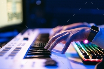 Man working in a modern technological sound and visual studio