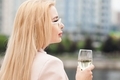 Millennial beautiful woman drinking wine at summer  - PhotoDune Item for Sale