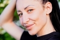 Close-up of the face of a brunette girl, candid portrait - PhotoDune Item for Sale