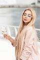 Millennial beautiful woman drinking wine at summer  - PhotoDune Item for Sale