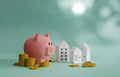 Piggy bank with gold coin and model house. Saving money for house concept, 3D render - PhotoDune Item for Sale